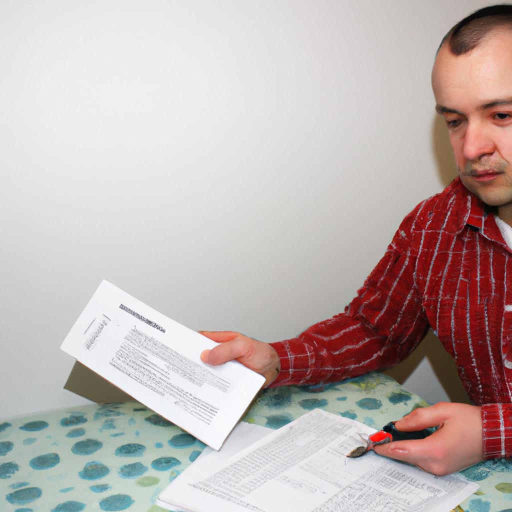 Man reviewing insurance policy documents
